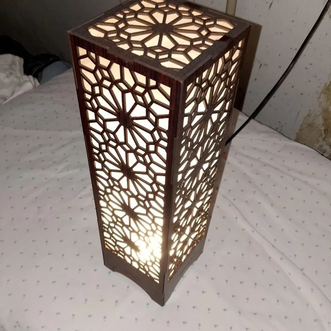 Large Wooden Floor Lamp with Intricate Cutout Design, Dark Brown, Golden Light