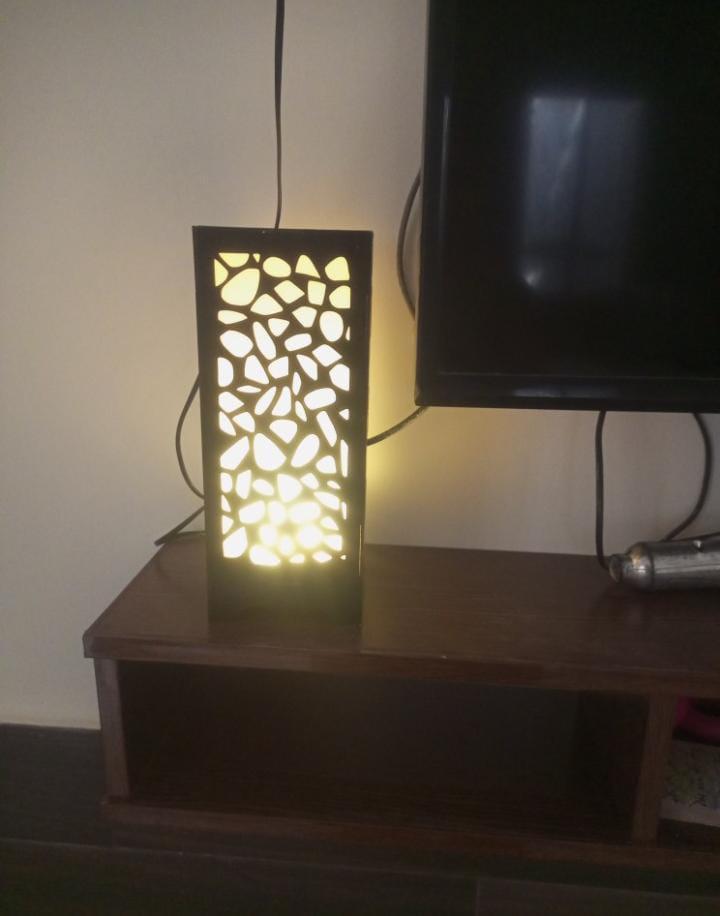 Medium Black Laser Cut Wooden Table Lamp with Golden Light